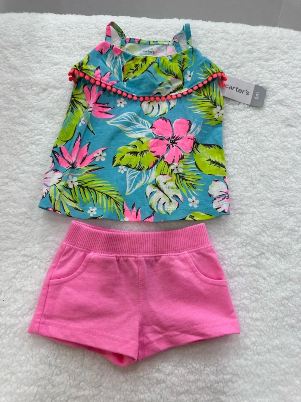 Two infant girl’s Carter’s summer outfits